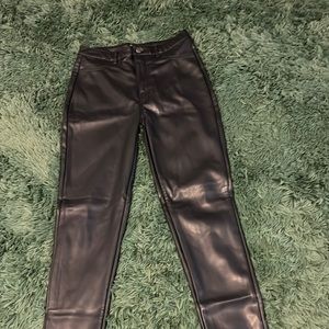 Black faux leather pants/leggings. Size medium.